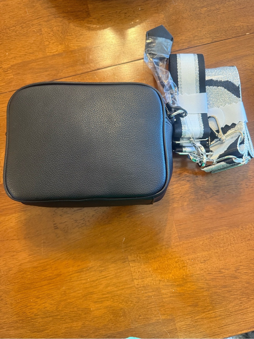 Men's Black Leather Crossbody Bag with Patterned Strap